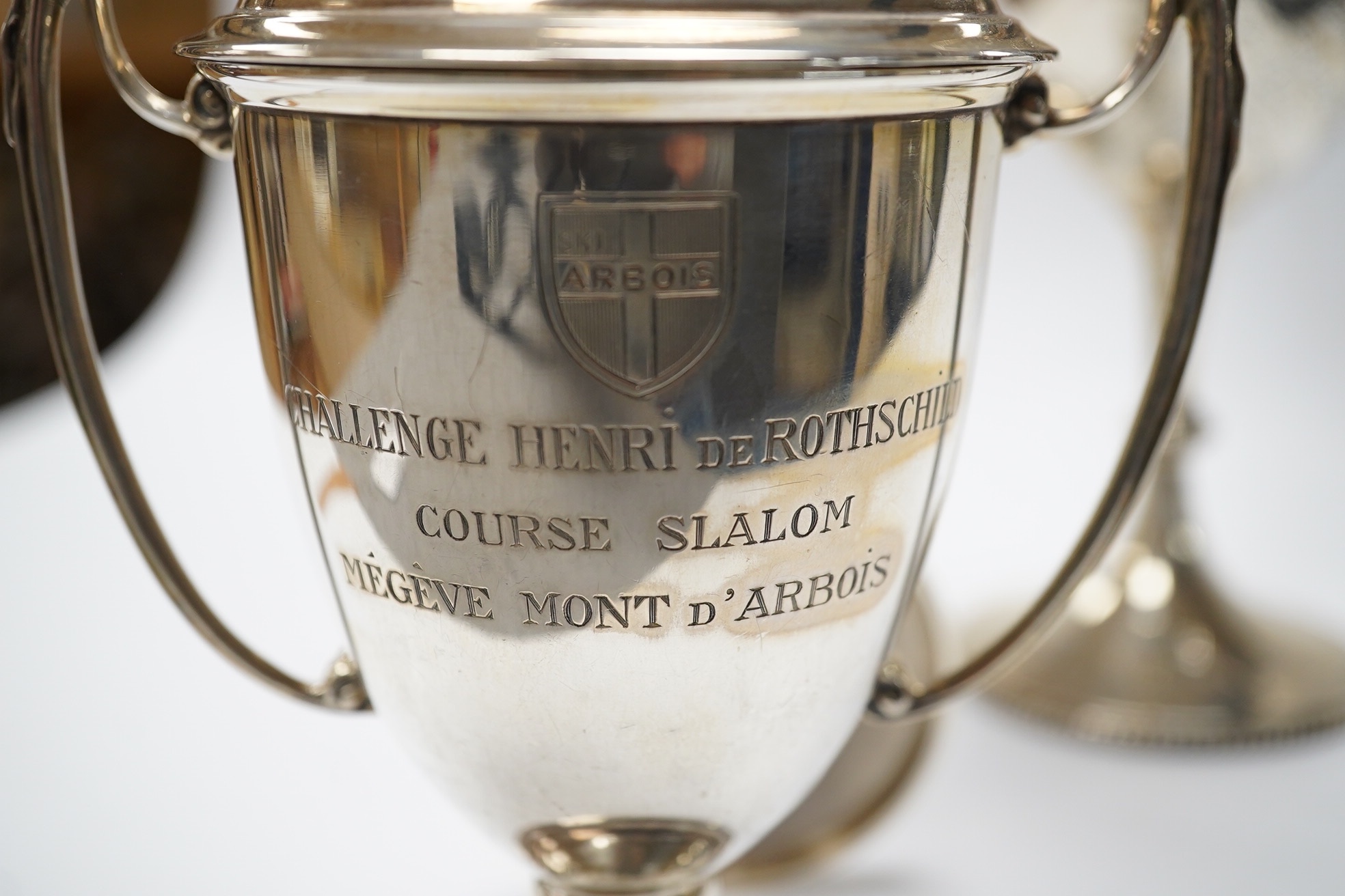 A Victorian engraved silver presentation goblet, with Masonic inscription, London, 1880, 19.5cm, together with a modern silver presentation goblet and a silver two handled presentation trophy cup and cover, 20.2oz. Condi